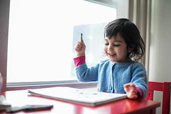Photo of a child in a child care facility