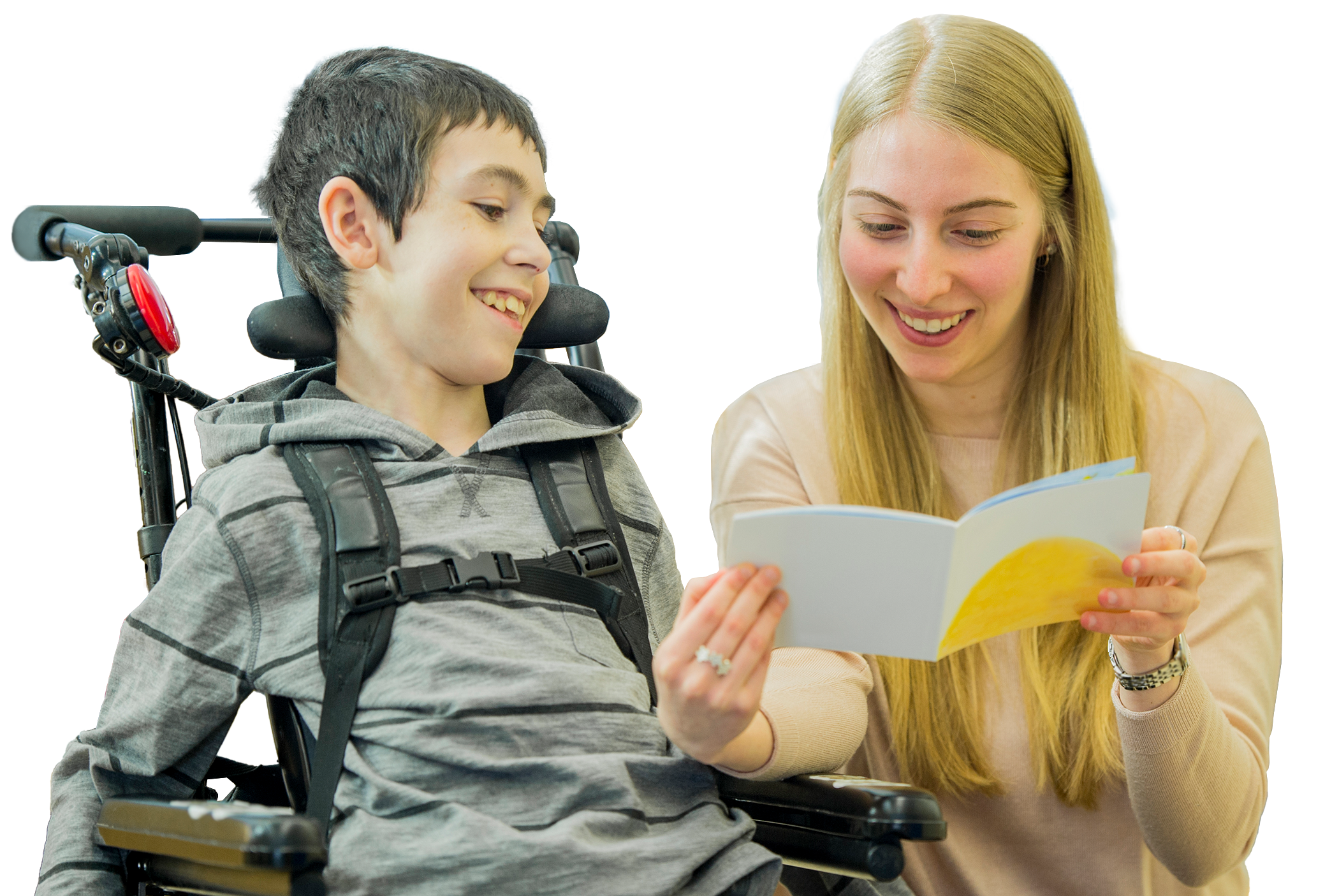 Photo d’un élève apprenant avec une enseignante.