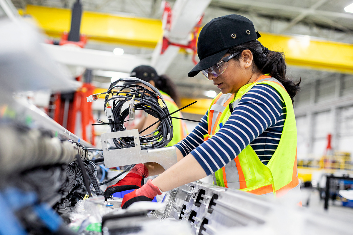 Photo of an employee working in a manufacturing facility in Brampton, Ontario.