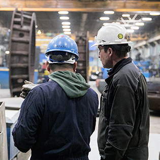 workers in manufacturing plant